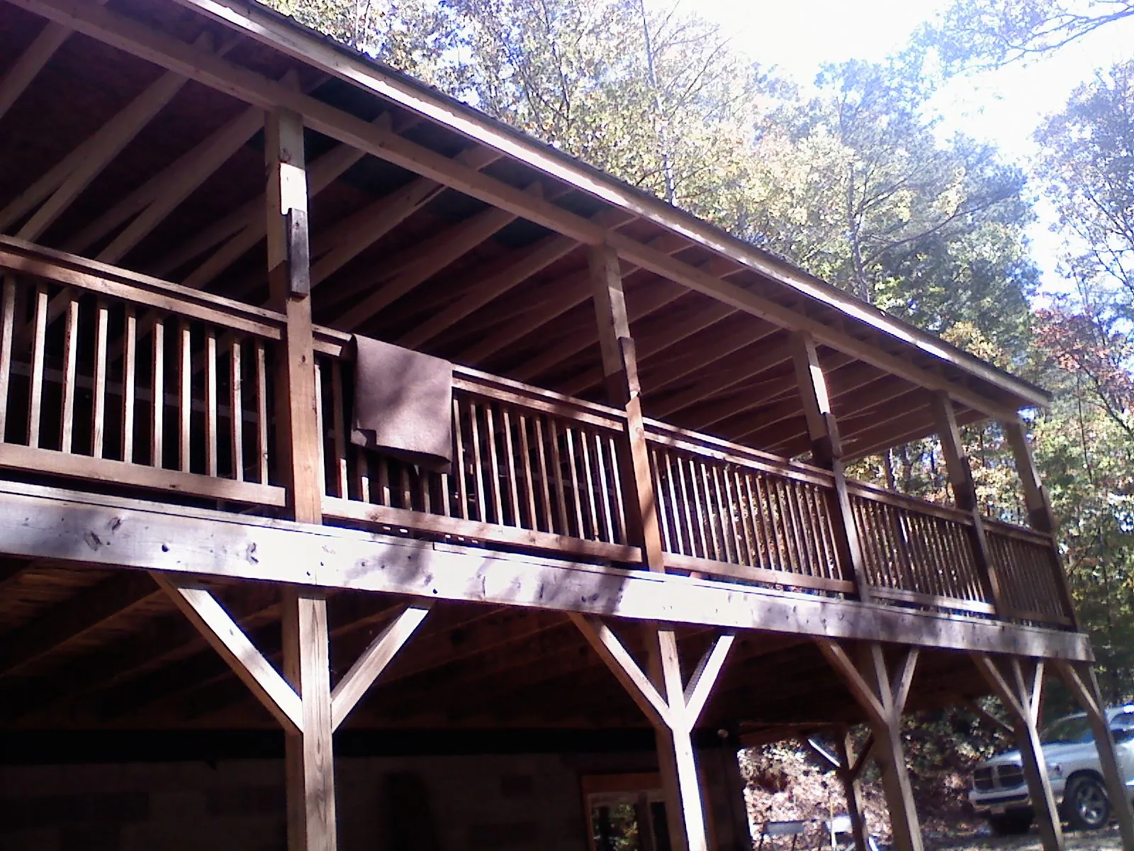 Timber framing under a new elevated porch and deck — Roof Leak Repair in West Ossipee by Roofing Brothers
